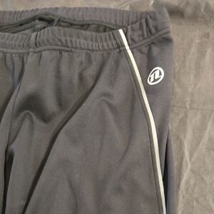 Novara Black Athletic Pants with Red Label
